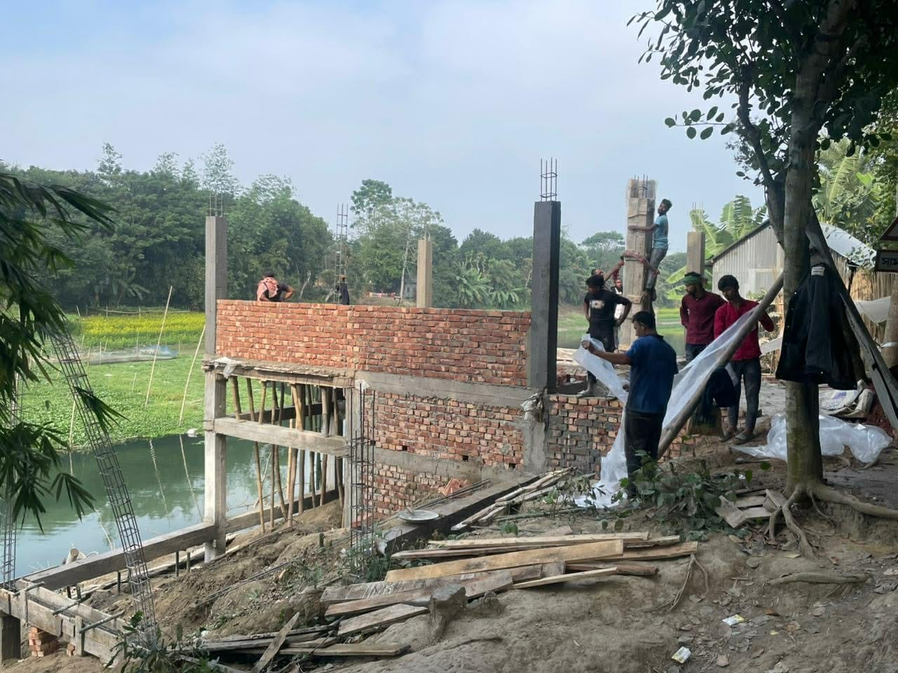 সালথায় কুমার নদী দখল করে পাকা স্থাপনা  নির্মাণ: হুমকিতে নদীর পরিবেশ